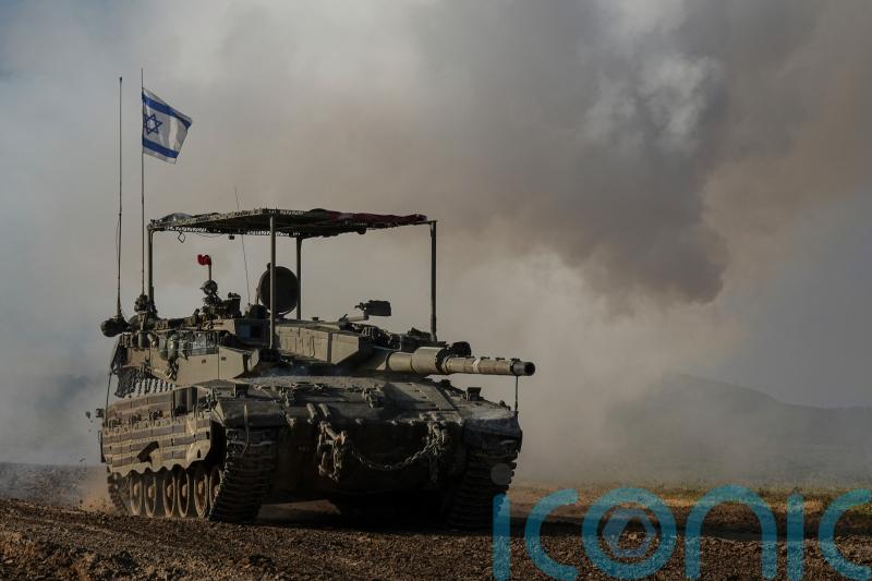 Death toll rises to 12 with dozens injured in a strike on a crowded Gaza shelter