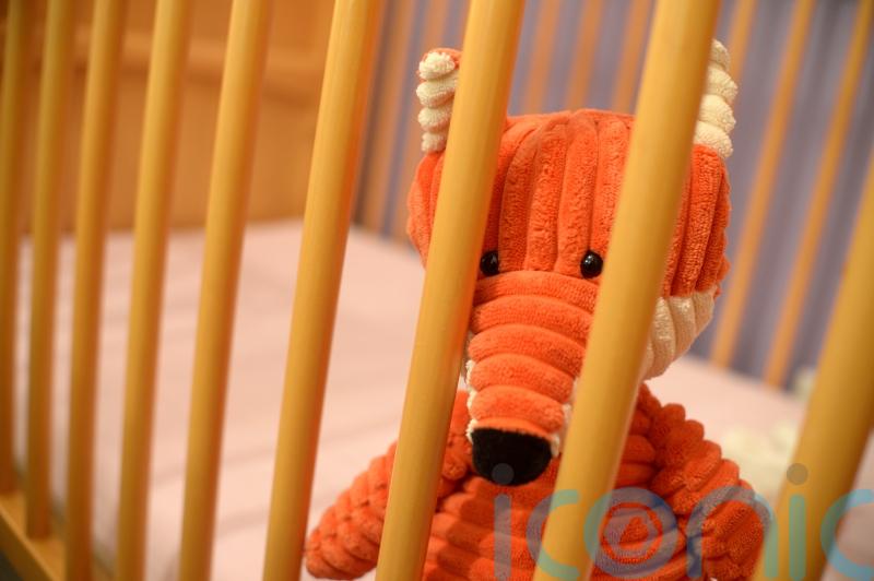 Safety warning over co-sleeping after 19 infant deaths last year