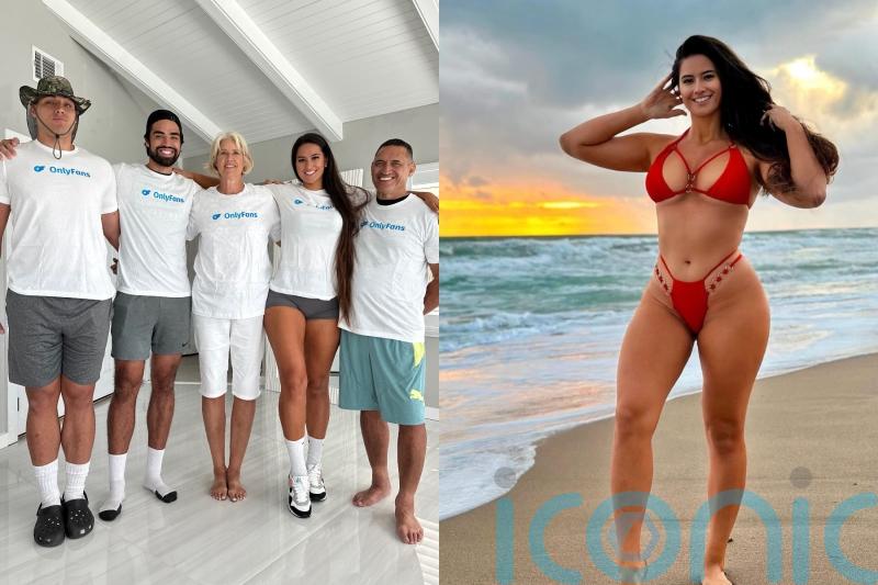 Six foot two woman who makes giant fetish OnlyFans content with tall family says they earn up to 800,000 dollars a month