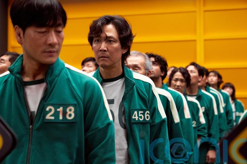 Player 456 takes ominous phone call in teaser for Squid Game series two