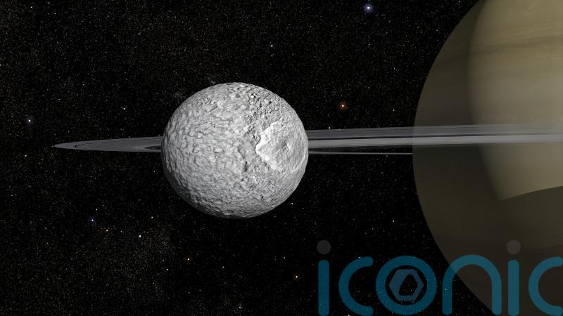 Saturn’s ‘Death Star’ moon may have a secret young ocean – scientists
