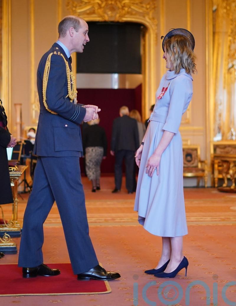 William back at work for investiture ceremony as King fights cancer