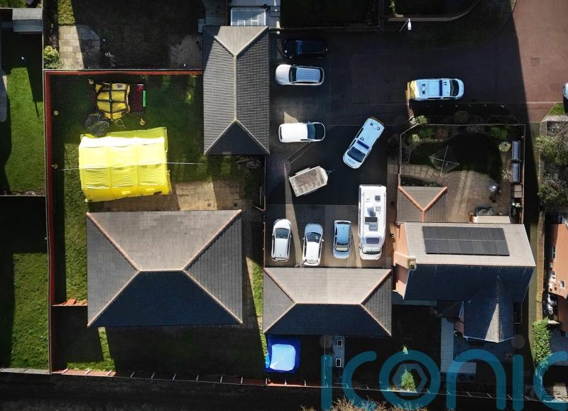 Woman arrested in poisoning probe