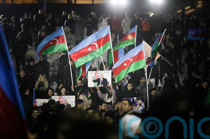 Azerbaijan’s Aliyev wins by a landslide in ‘restrictive’ election