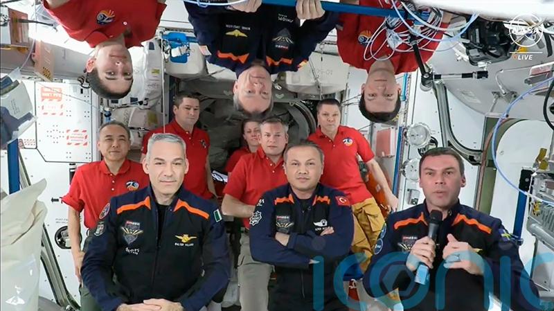 Astronauts return to Earth after private space station trip
