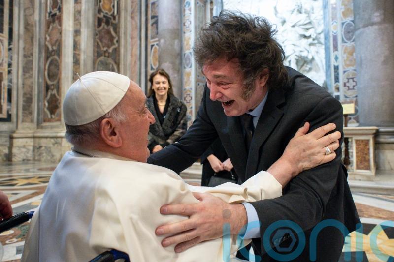 Pope and president embrace as Francis canonises Argentina’s first female saint