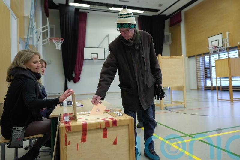 Finns vote for new president to guide new Nato member as Russia’s neighbour