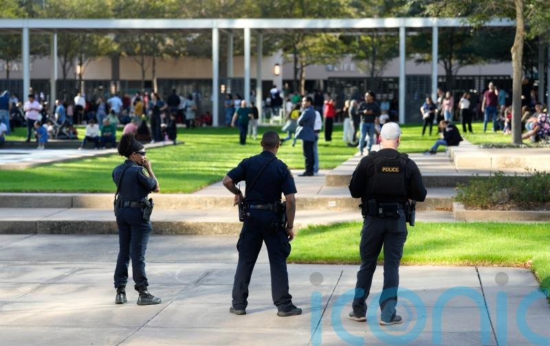 Boy critically injured in Texas megachurch shooting is ‘son of suspect’, police say