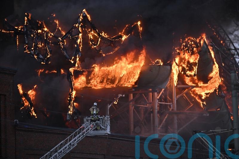 One person missing as firefighters battle Sweden water park blaze for second day