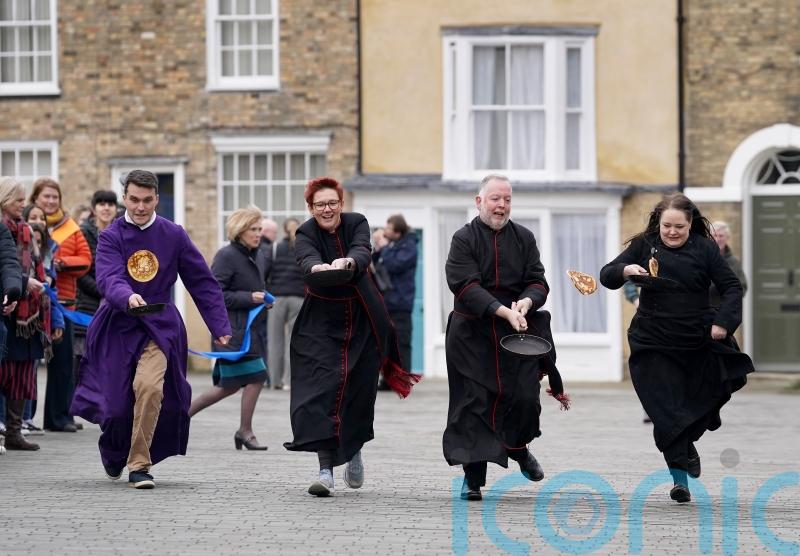 Canterbury Cathedral hosts first pancake race in decades for Shrove Tuesday