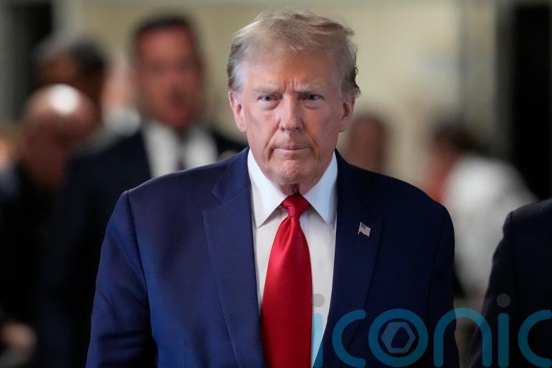 Trump to stand trial on hush money charges in March, judge rules