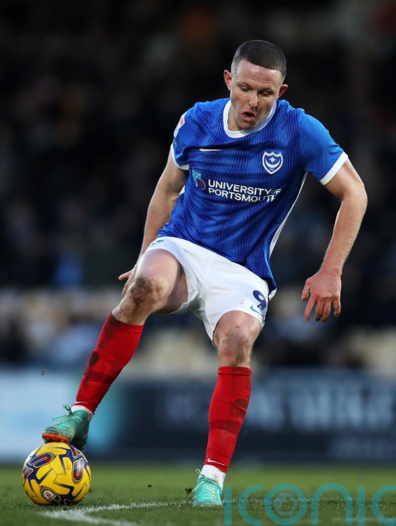 Portsmouth hammer Reading to strengthen hold on top spot