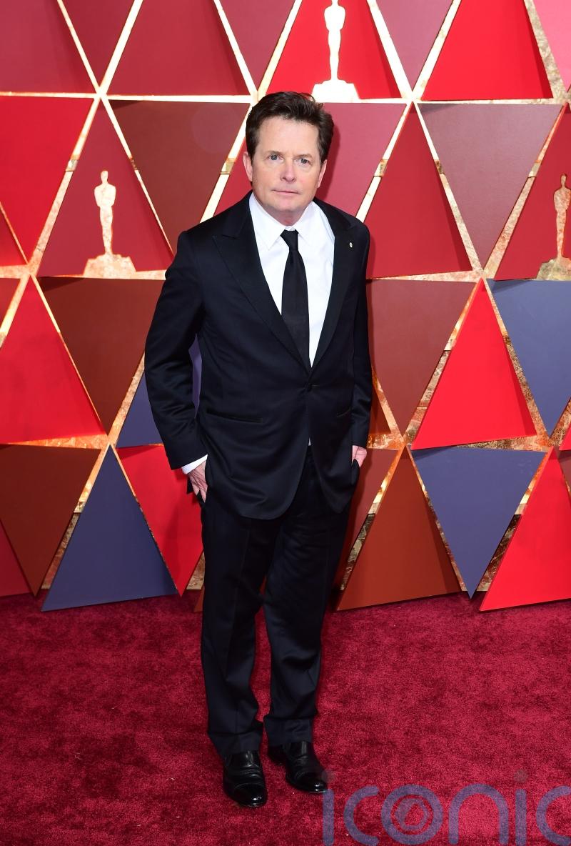Michael J Fox given standing ovation after surprise appearance at Bafta awards