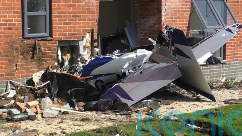 Pilot bailed out moments before plane crashed into flats