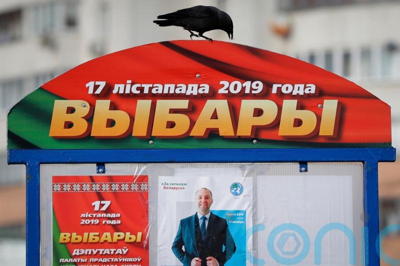 Belarusians vote in tightly controlled election amid calls for boycott