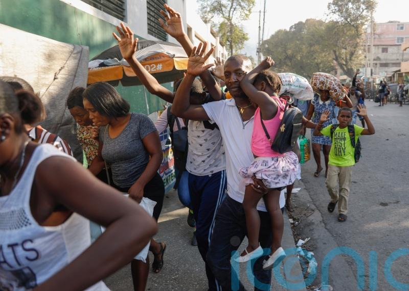 Gunfire paralyses Haiti’s capital as gang leader threatens police chief