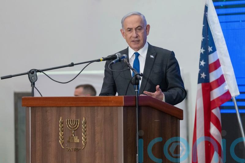 Cracks widen in Netanyahu’s government as top political rival arrives in US