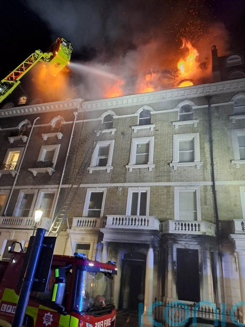 Dramatic footage of flats fire rescue released by police as suspect arrested