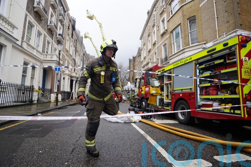 Video footage of police officers running into burning building released