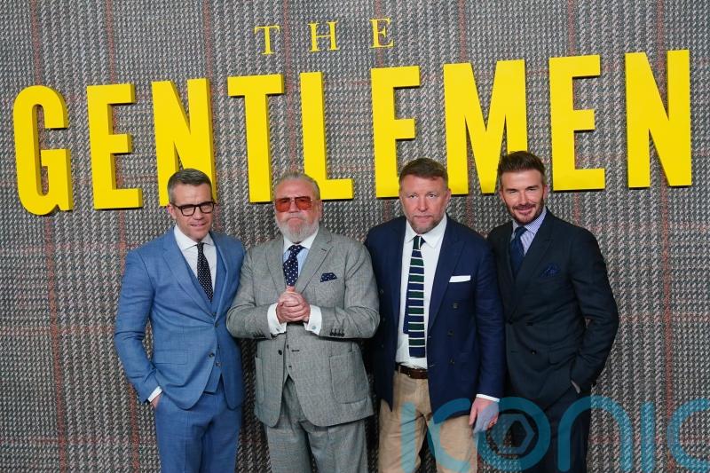 In pictures: David Beckham poses among stars of The Gentlemen at London premiere