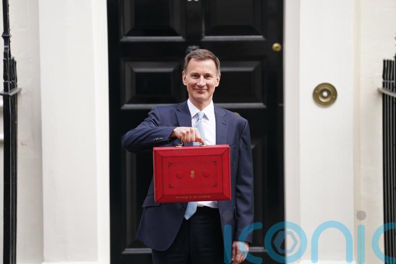 Hunt promises to cut taxes and boost growth in pre-election Budget