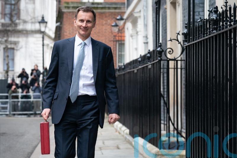 Hunt cuts national insurance in pre-election Budget giveaway