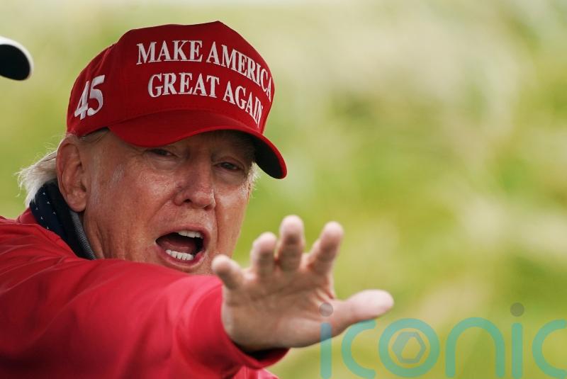 Donald Trump to pay legal fees of company sued over dossier allegations
