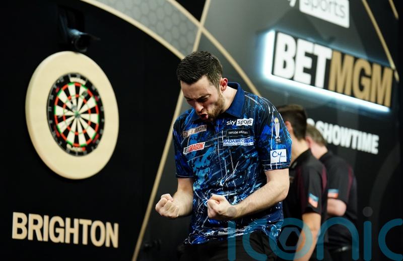 Luke Humphries secures first Premier League win with victory over Michael Smith