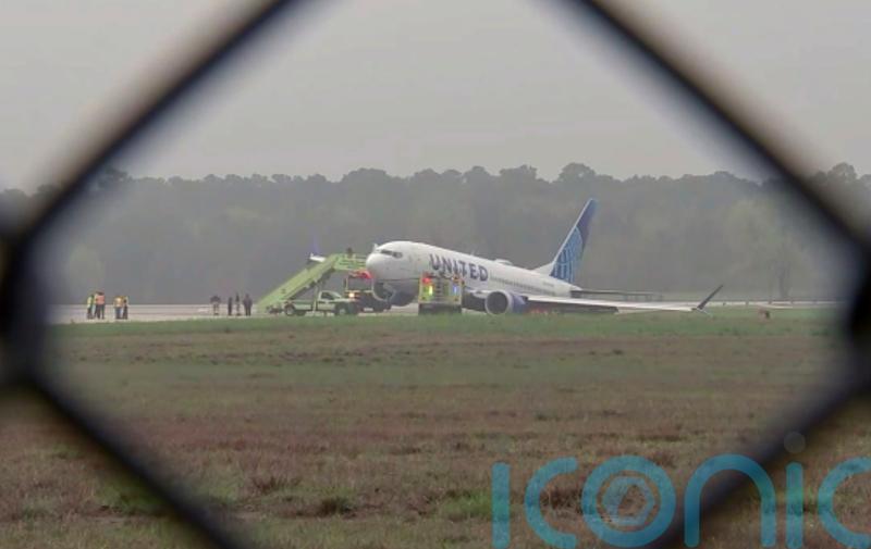 Passengers evacuated as United Airlines plane rolls off the runway in Texas