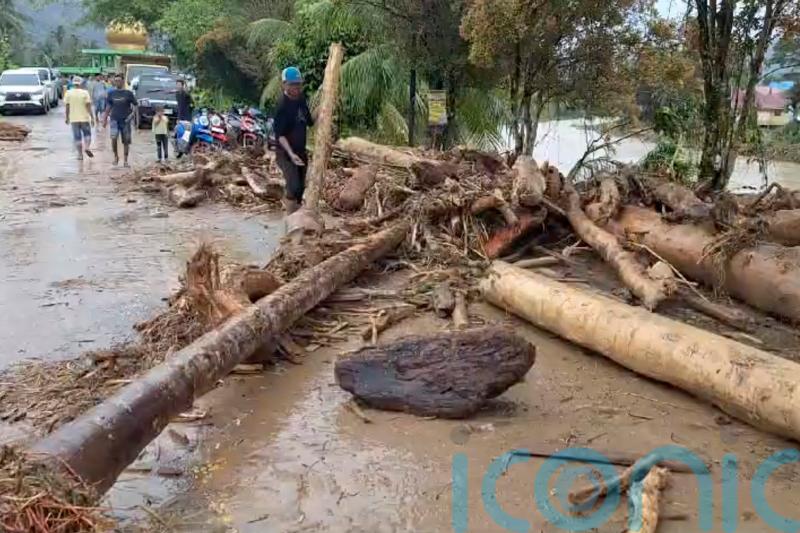 At least 26 dead after flash floods and landslides in Sumatra