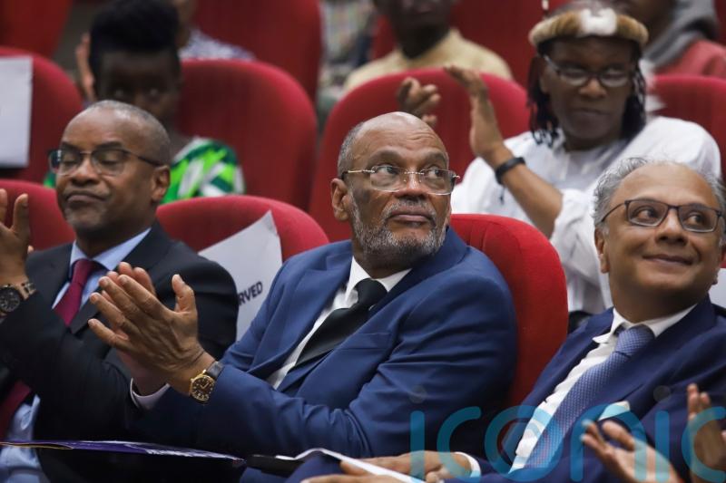 Haiti’s prime minister says he will resign amid rising violence
