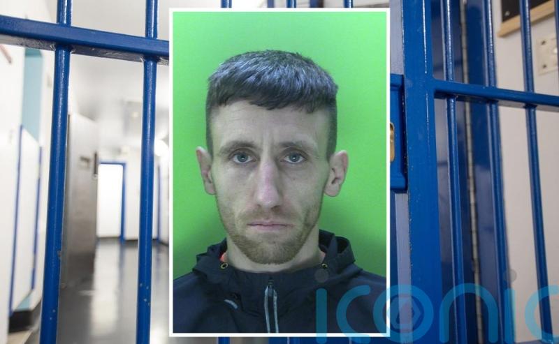 Burglar who cut hole in floor of military museum to steal haul of silver jailed