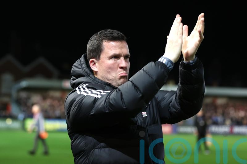 Gary Caldwell hails 10-man Exeter’s character in win over Burton