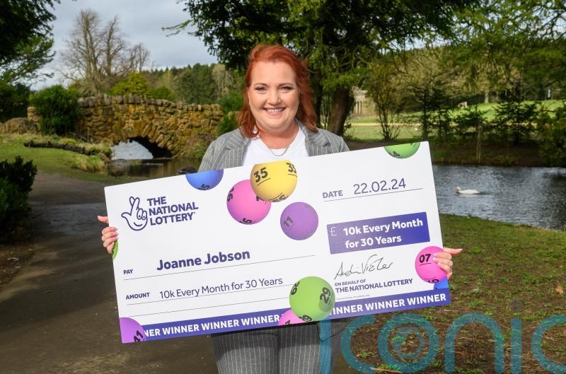 Carer, 51, to buy home and holidays after winning £10,000 a month for 30 years