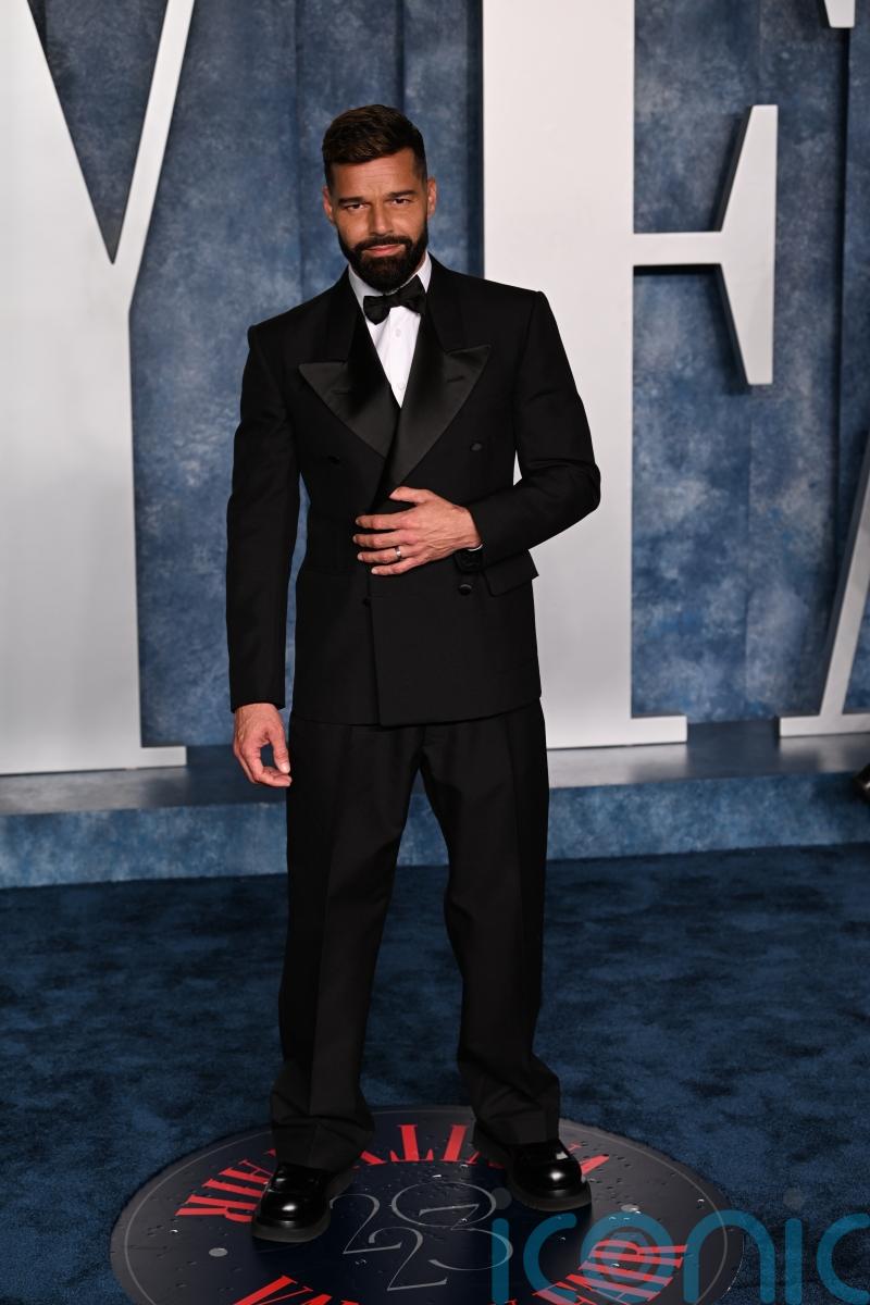 Pop star Ricky Martin says his father encouraged him to come out as gay