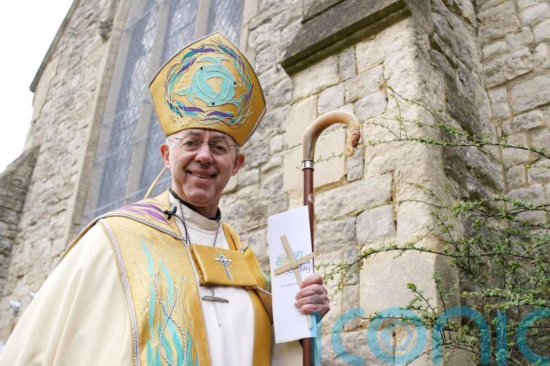 Archbishop of Canterbury leads Palm Sunday procession at start of Holy Week