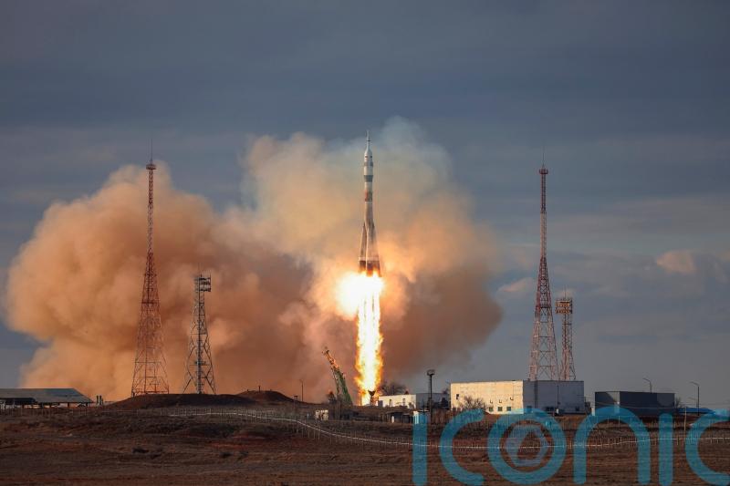 Russian Soyuz spacecraft docks at International Space Station