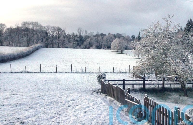 Snow falls in south-west England and Wales ahead of wet and windy weather