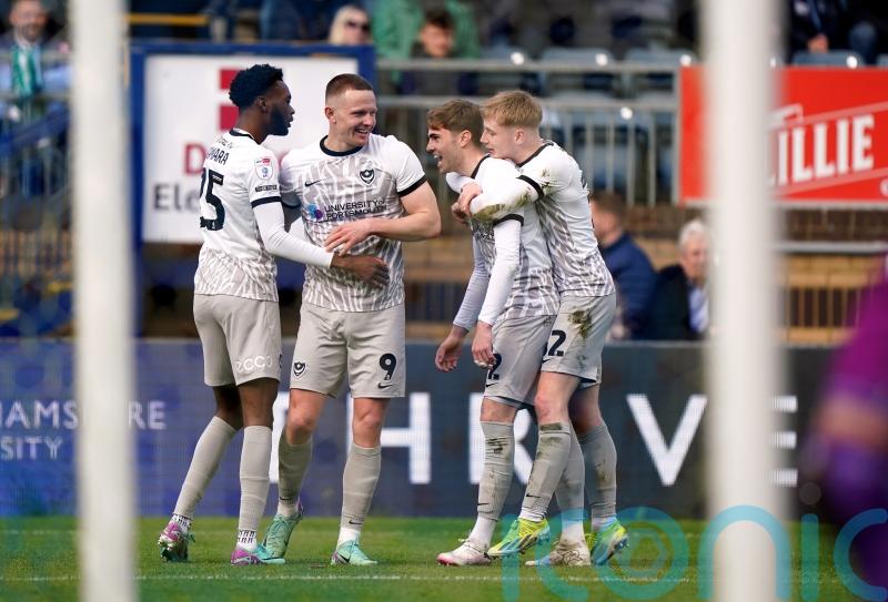 Colby Bishop double fires leaders Portsmouth to win at Wycombe