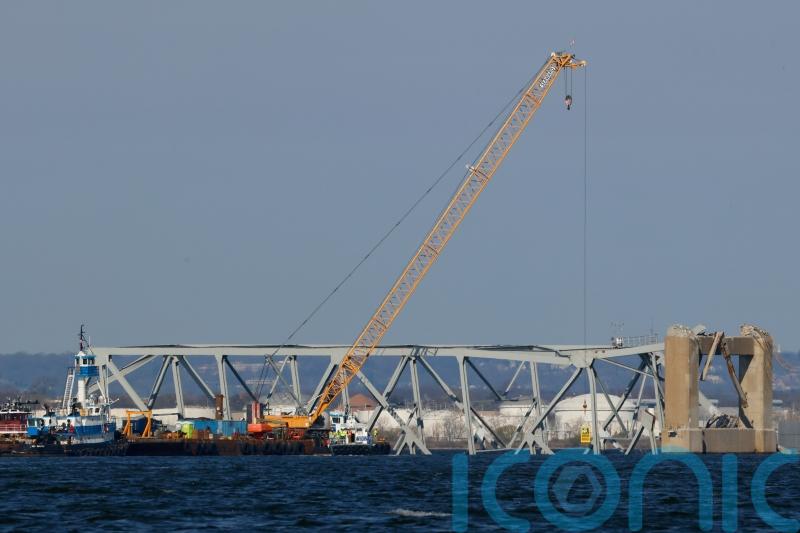 Work starts to cut and lift first section of collapsed Maryland bridge