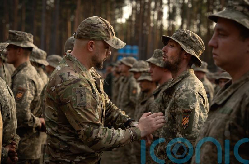 Ukraine lowers conscription age to plug shortfall in troops fighting Russia