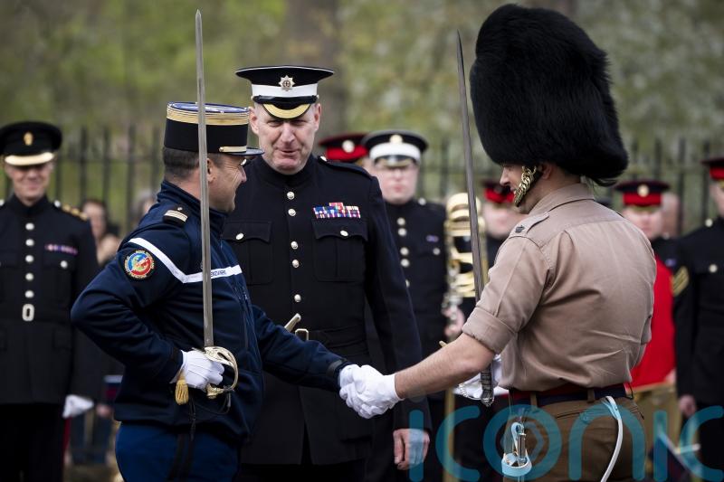 Stage set for landmark Changing of the Guard between French and British troops