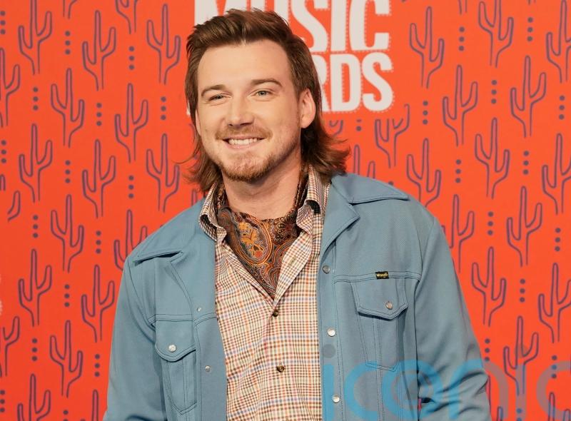 Country star Morgan Wallen arrested ‘after throwing chair off roof of bar’
