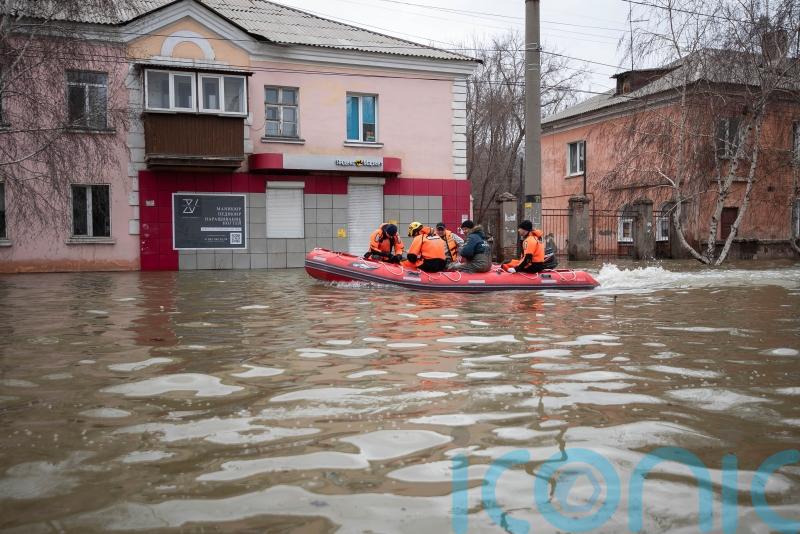 Russians stage rare protest after dam bursts and homes flood