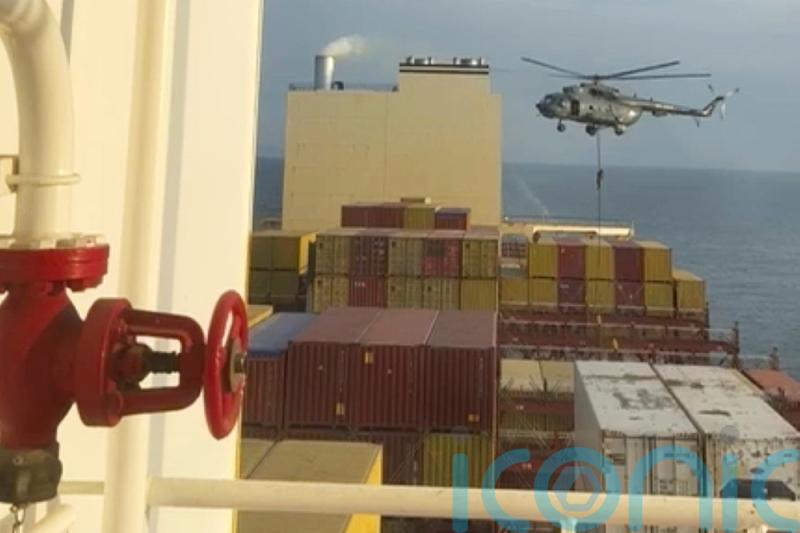Iran blamed after armed men attack ship near Strait of Hormuz