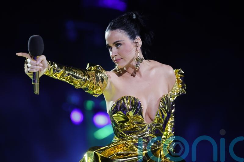 Katy Perry suffers major wardrobe malfunction as metal top breaks during filming