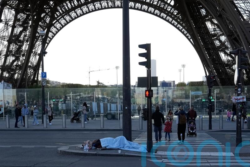 French police evict hundreds from abandoned Paris warehouse ahead of Olympics