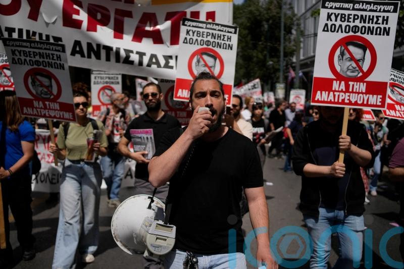 Unions in Greece call widespread strikes, seeking return of bargaining rights