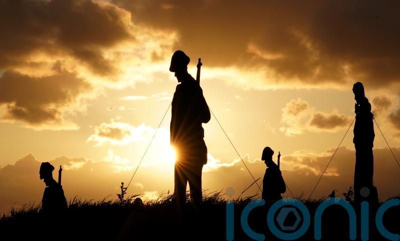 Silhouettes of 1,475 servicemen and two women who died on D-Day installed