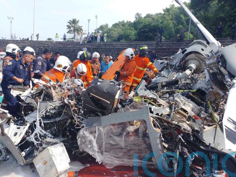 Two Malaysian military helicopters collide and crash, killing 10 people on board